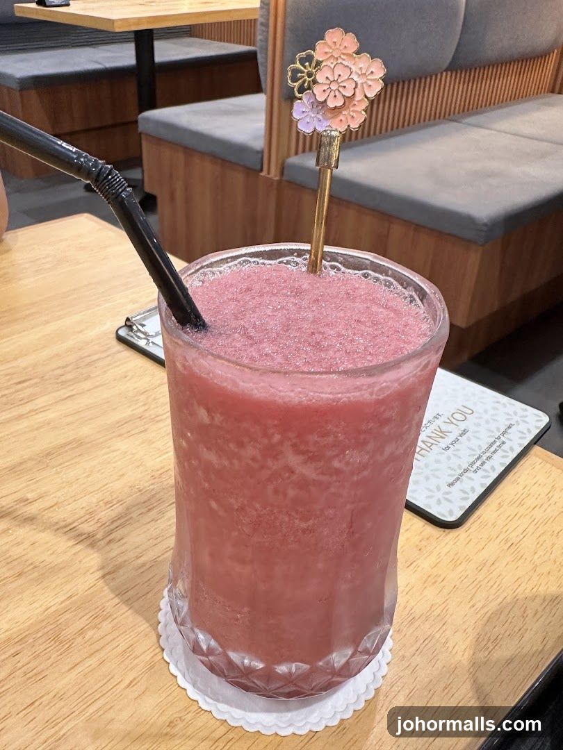Pink Smoothie with Flower Garnish