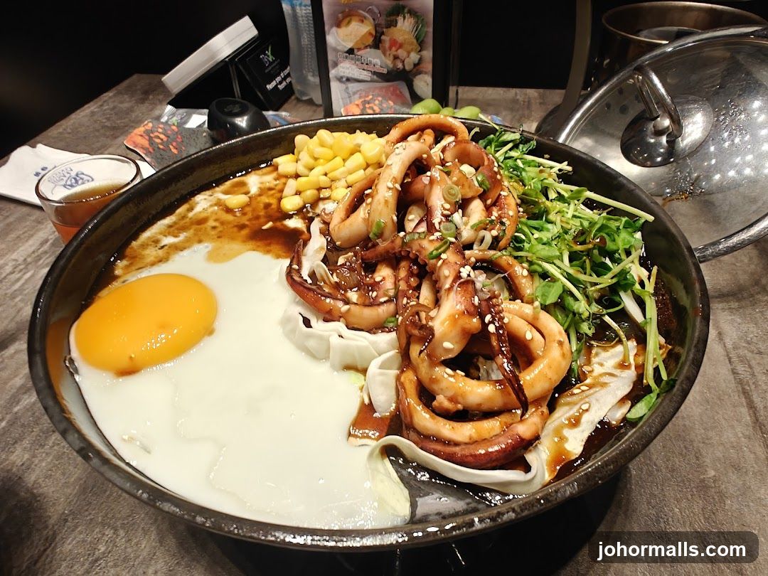 Sizzling Squid and Egg Dish