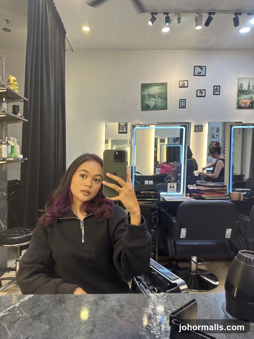 Woman taking a selfie in a salon