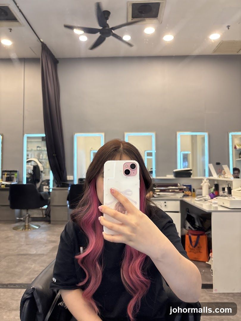 Woman taking a selfie in a salon