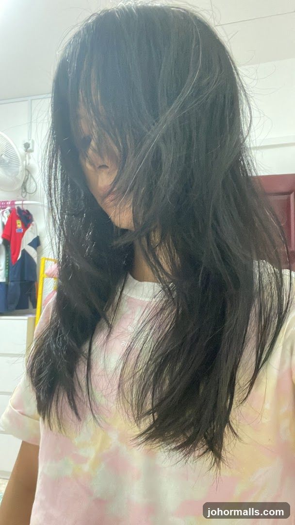 Person with long dark hair