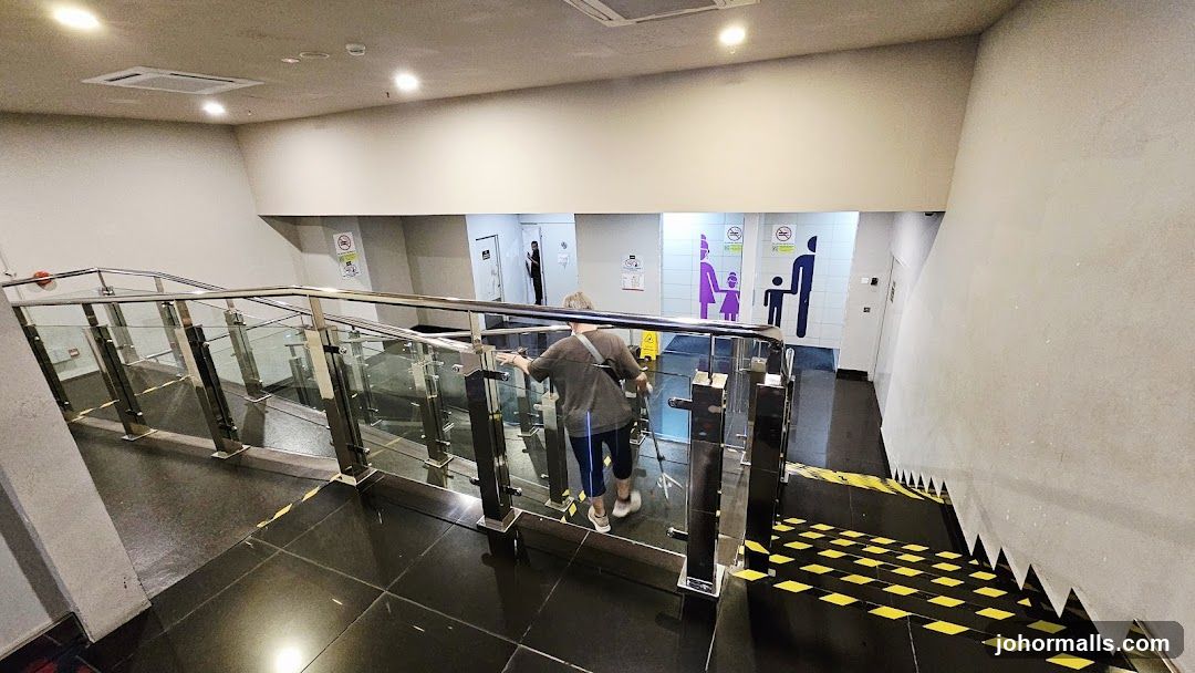 Stairwell with Restroom Signs