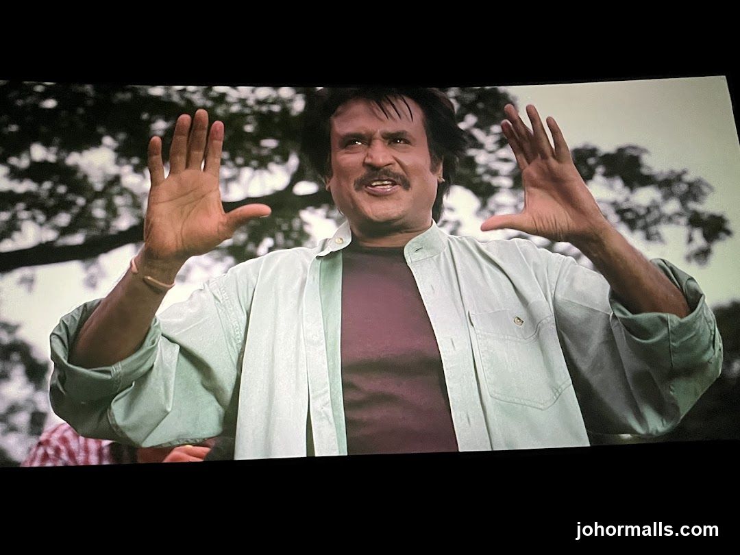 Man with hands raised