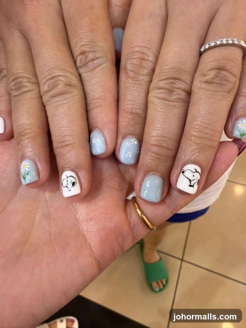 Peanuts-themed manicured nails