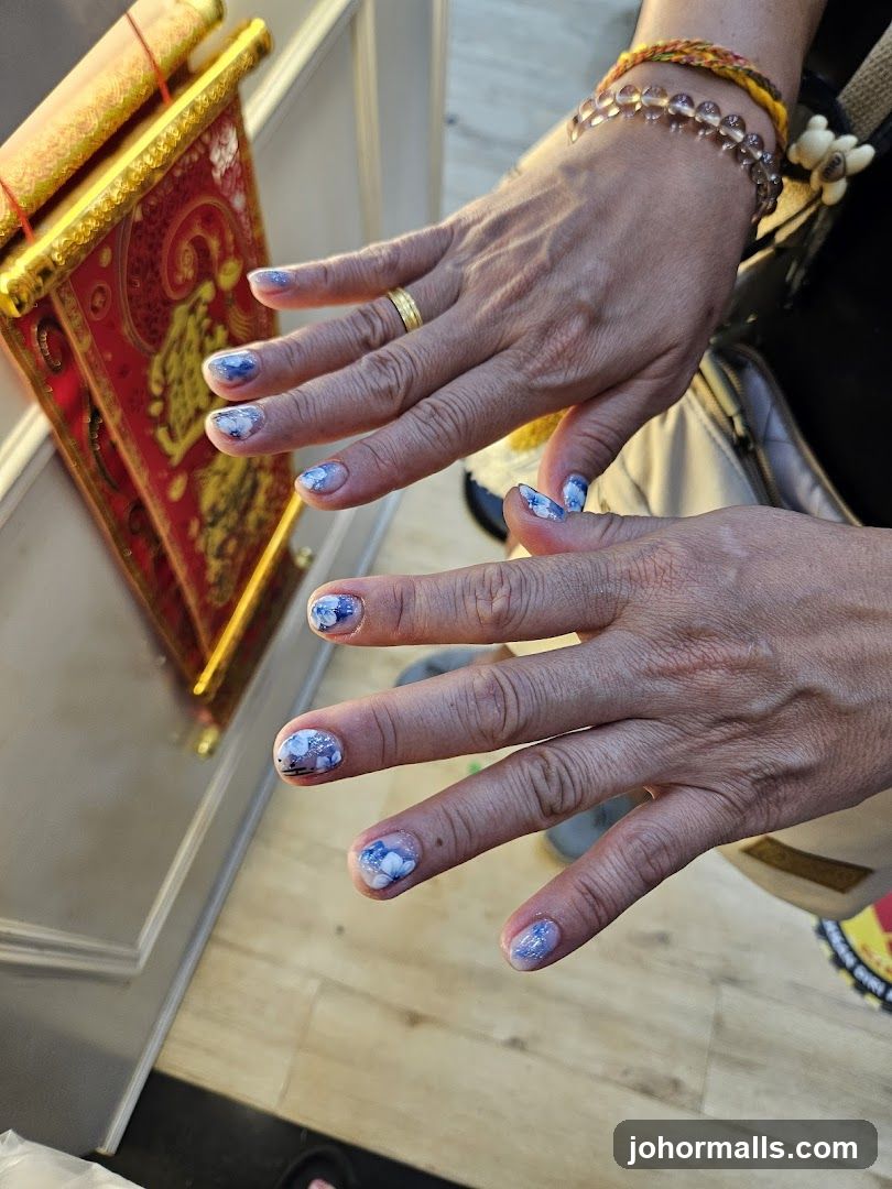 Hands with Floral Nail Art