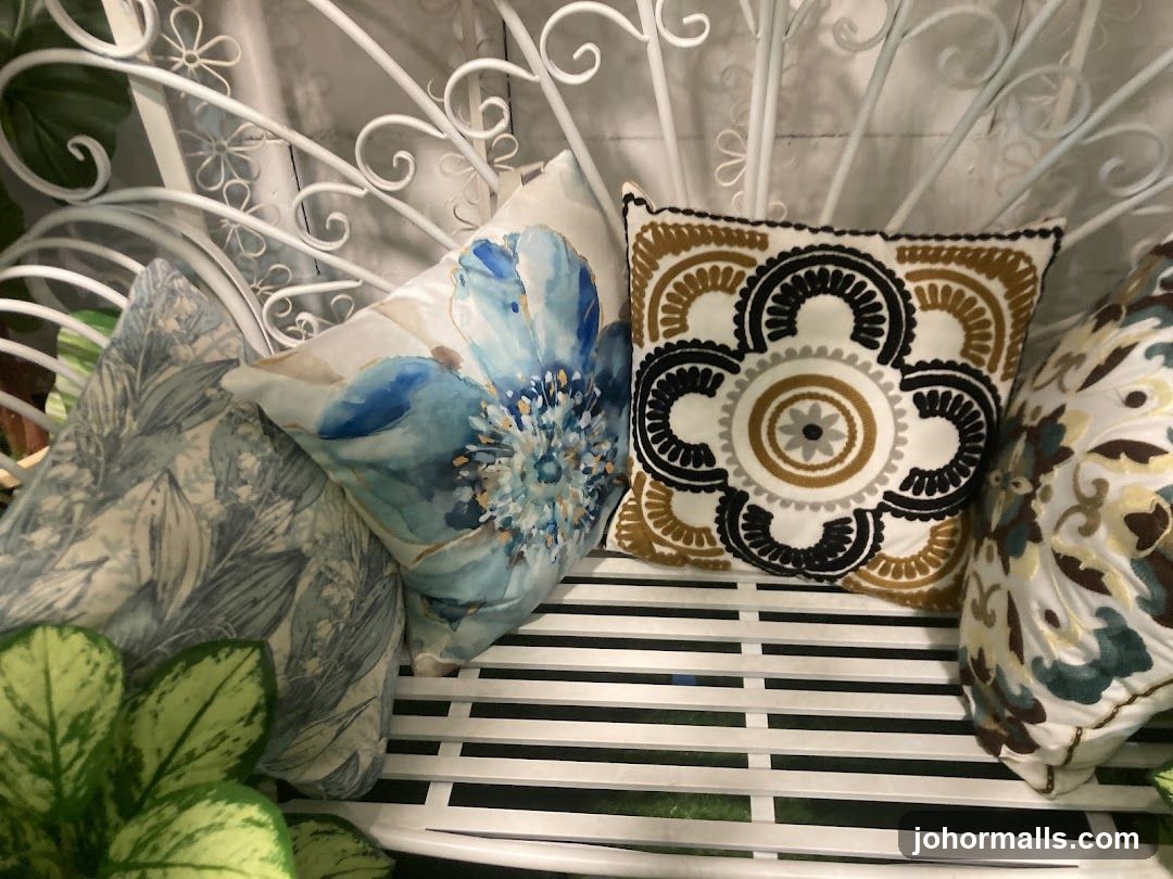 Decorative Pillows on White Bench