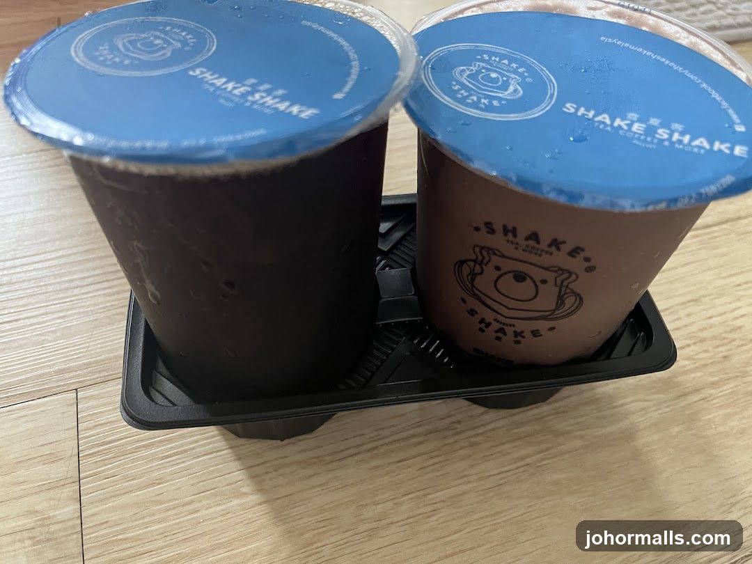 Two drinks in a holder