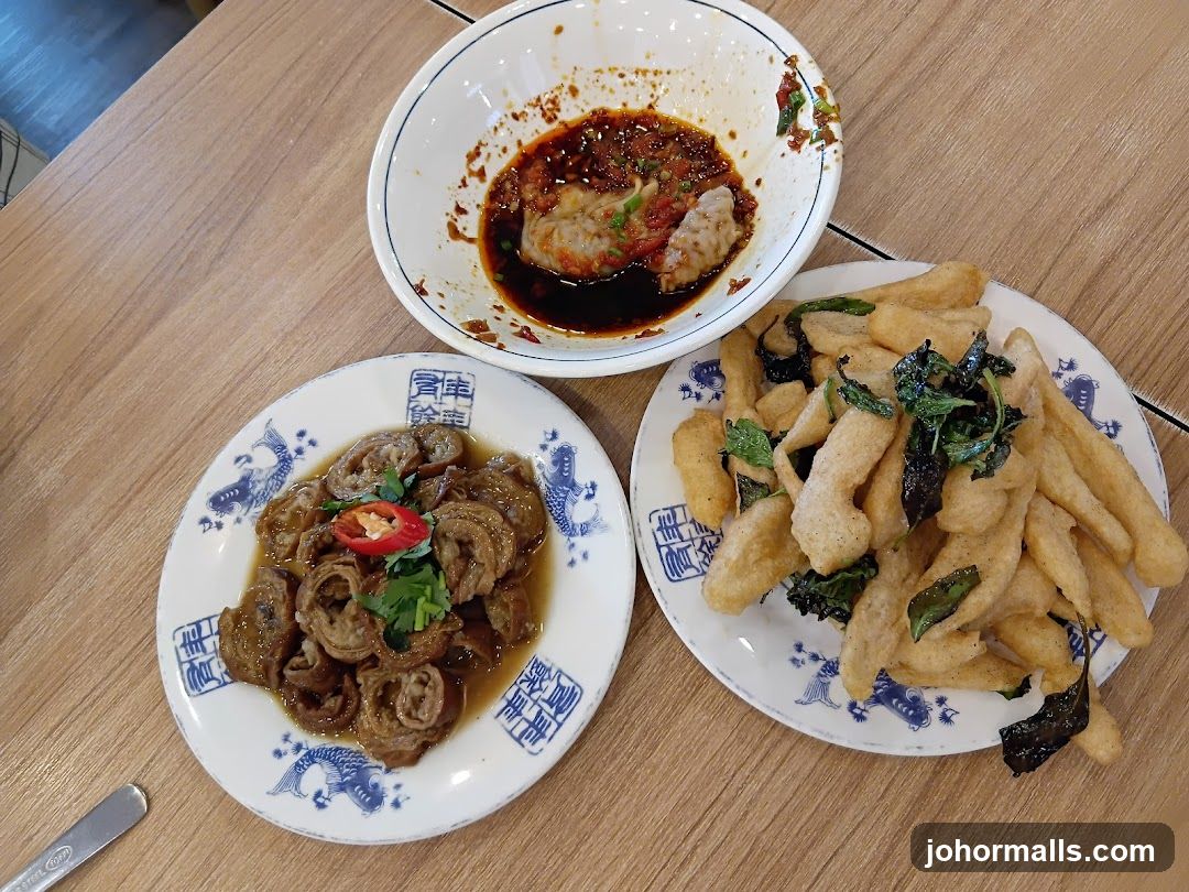 Three dishes of food on a table