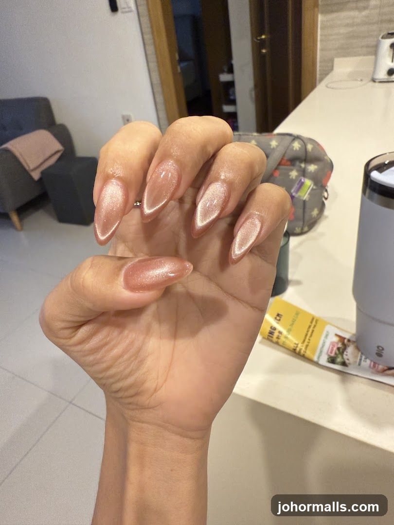 Woman's hand with almond-shaped nails