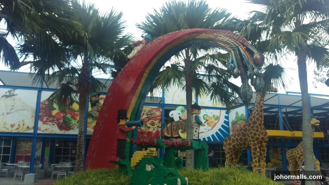 Lego-themed outdoor dining area with colorful decorations