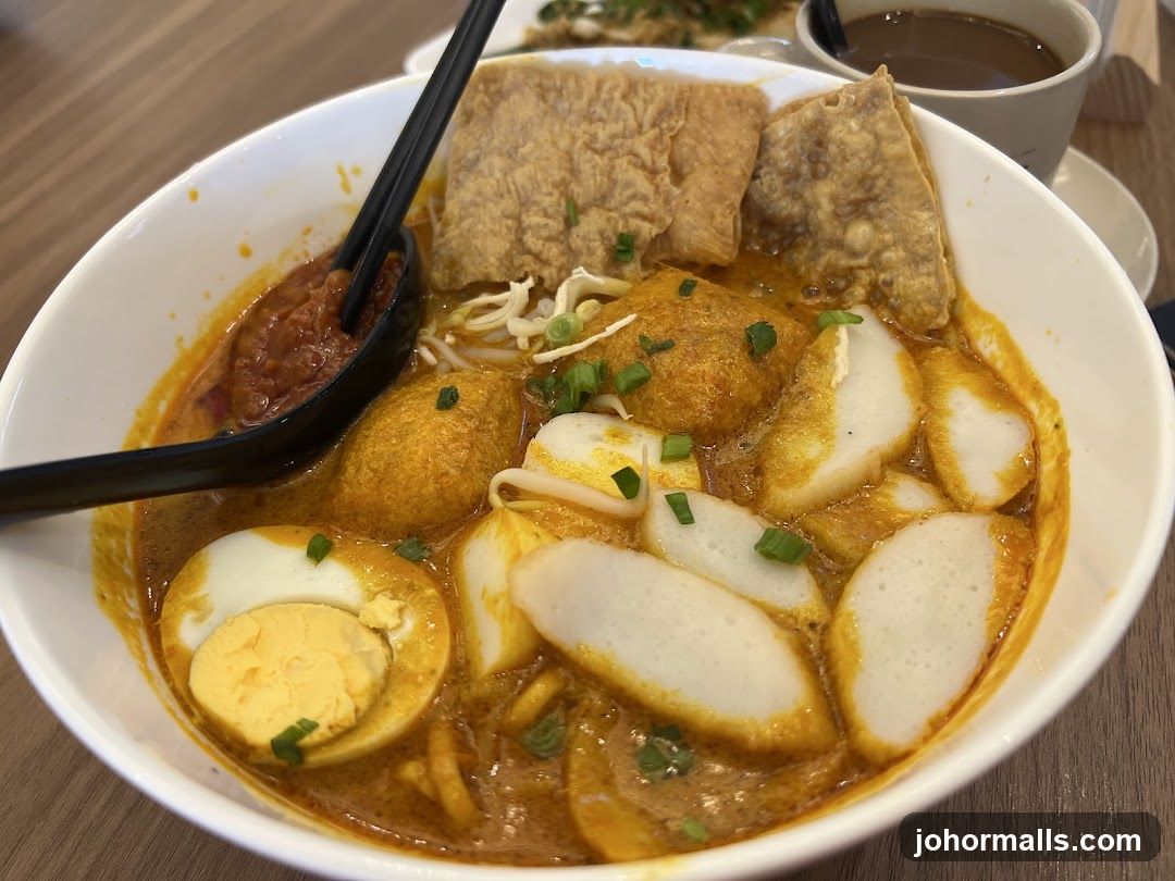 Curry Laksa with Egg and Fish Cakes