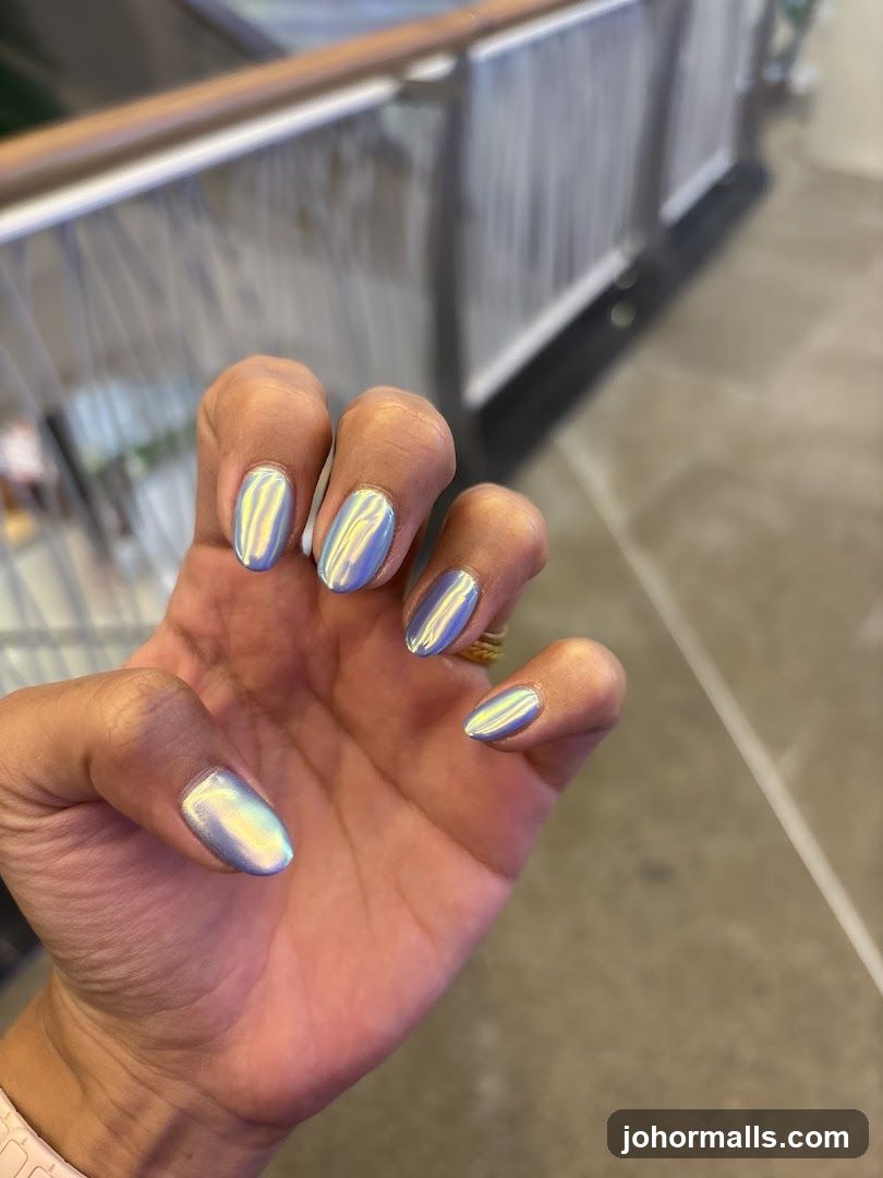 Woman's Hand with Pearlescent Nails