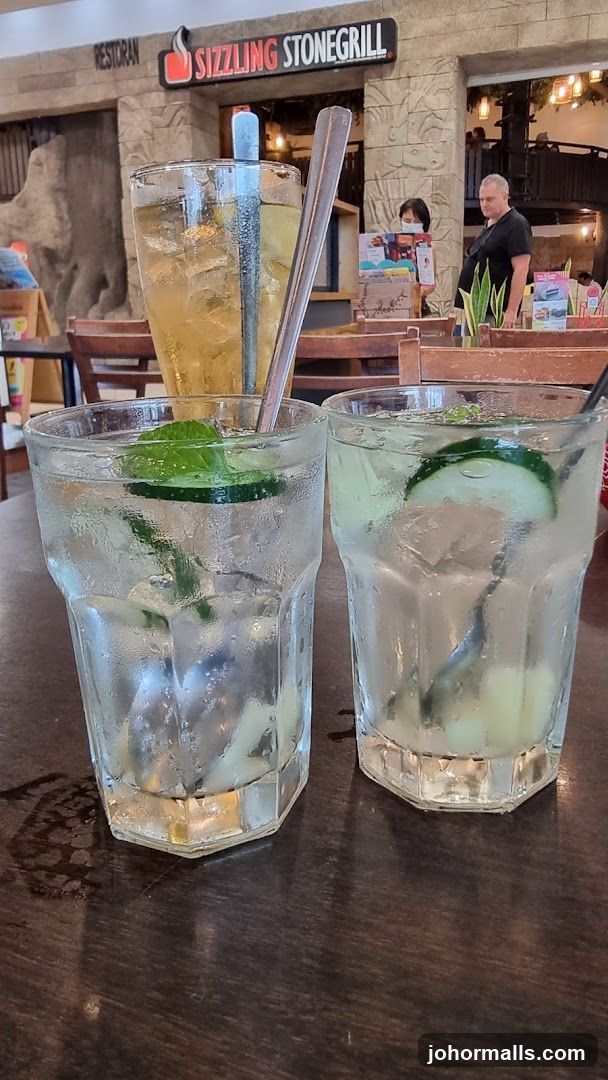 Drinks with Sizzling Stonegrill Signage