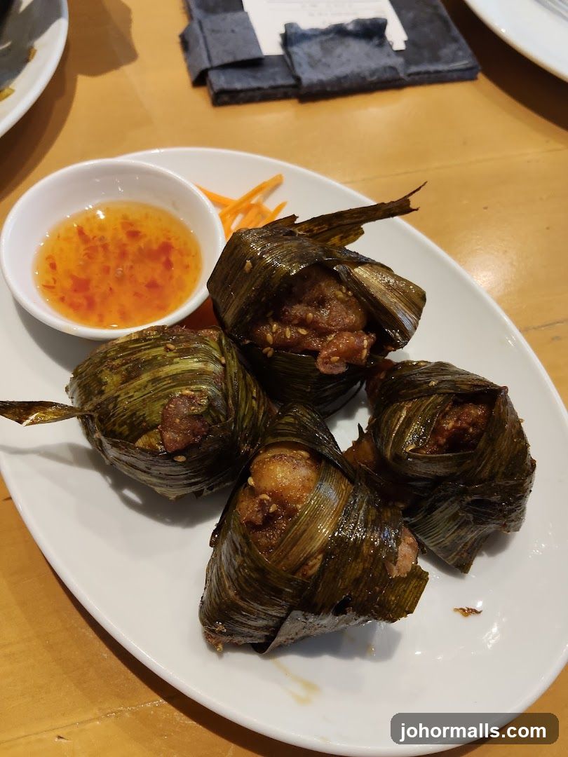 Chicken wrapped in pandan leaves