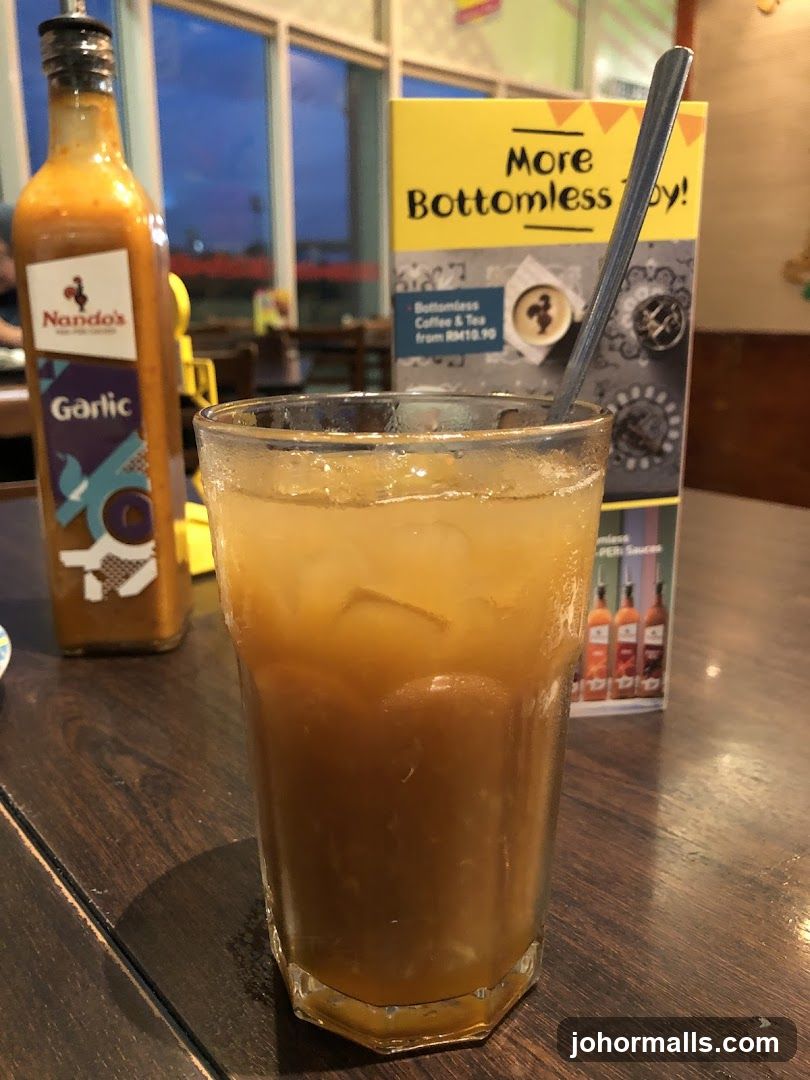 Nando's Garlic Sauce and Iced Drink