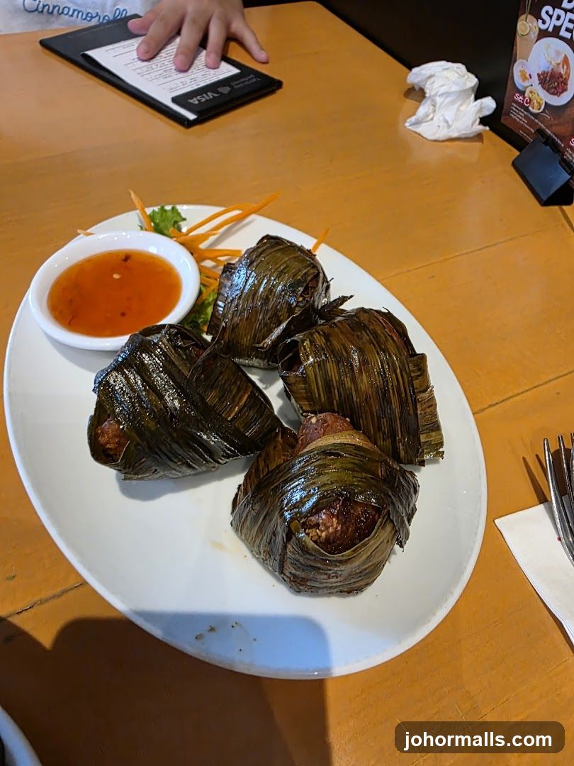 Chicken wrapped in pandan leaves