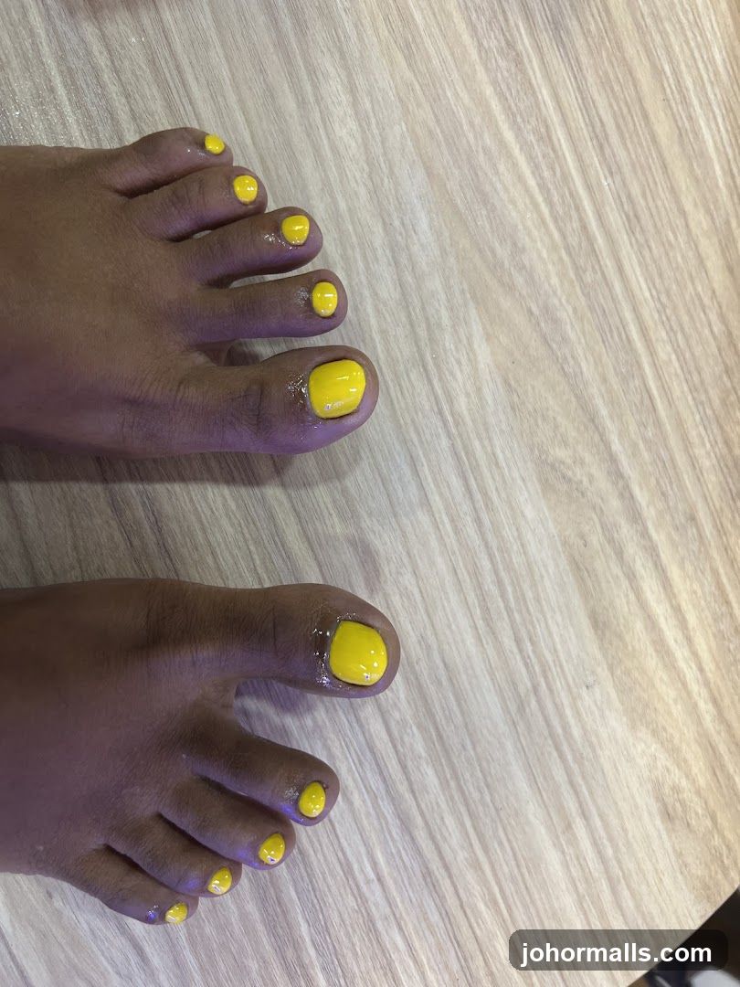 Toes with Yellow Nail Polish