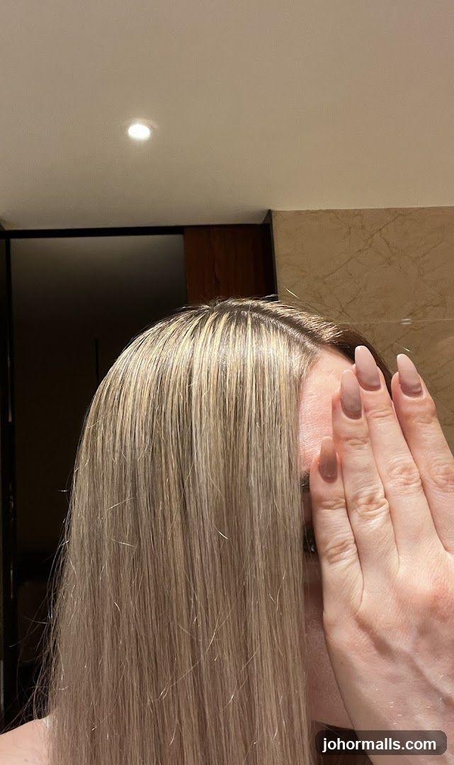 Woman covering her eye with her hand