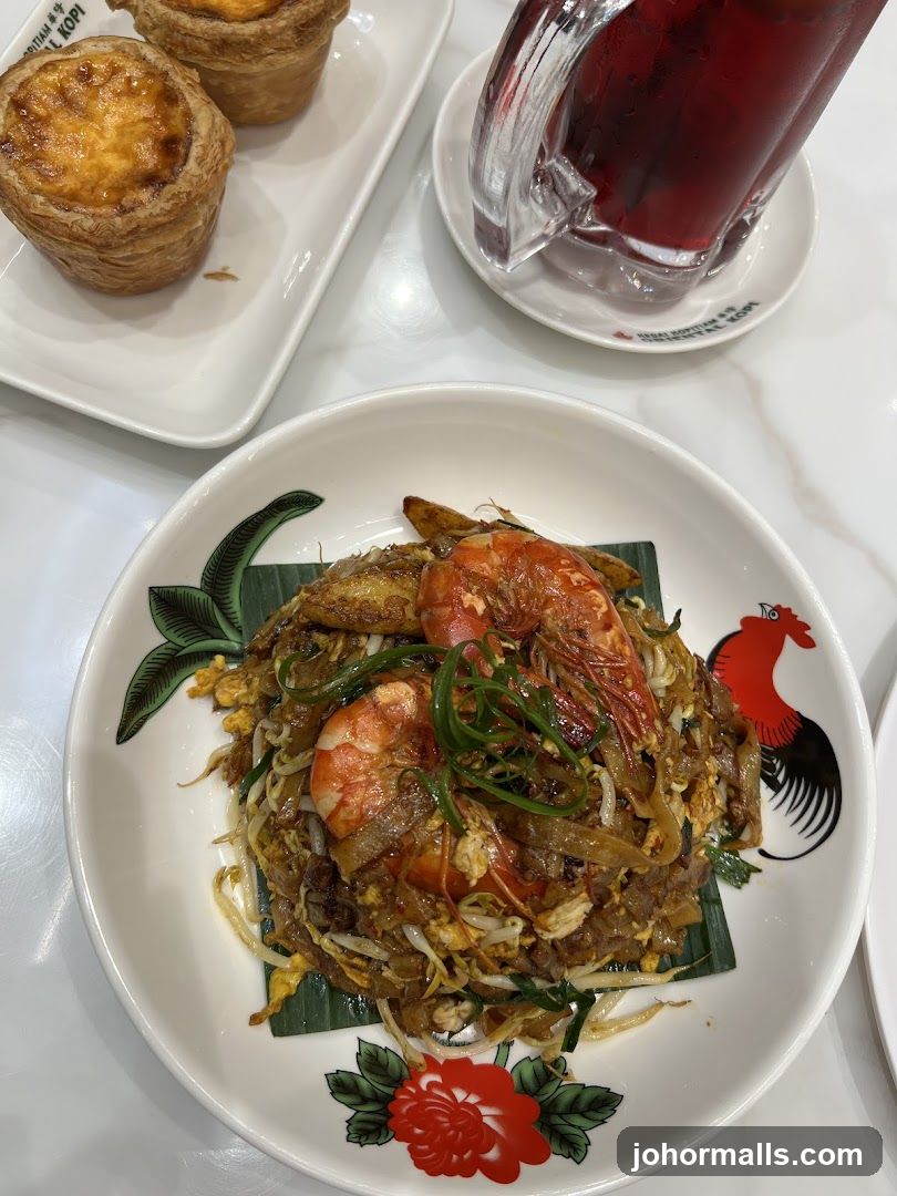 Char Kway Teow with Prawns and Egg Tarts
