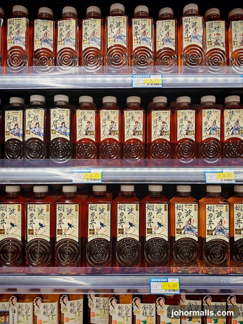 Bottles of Tea on Shelves