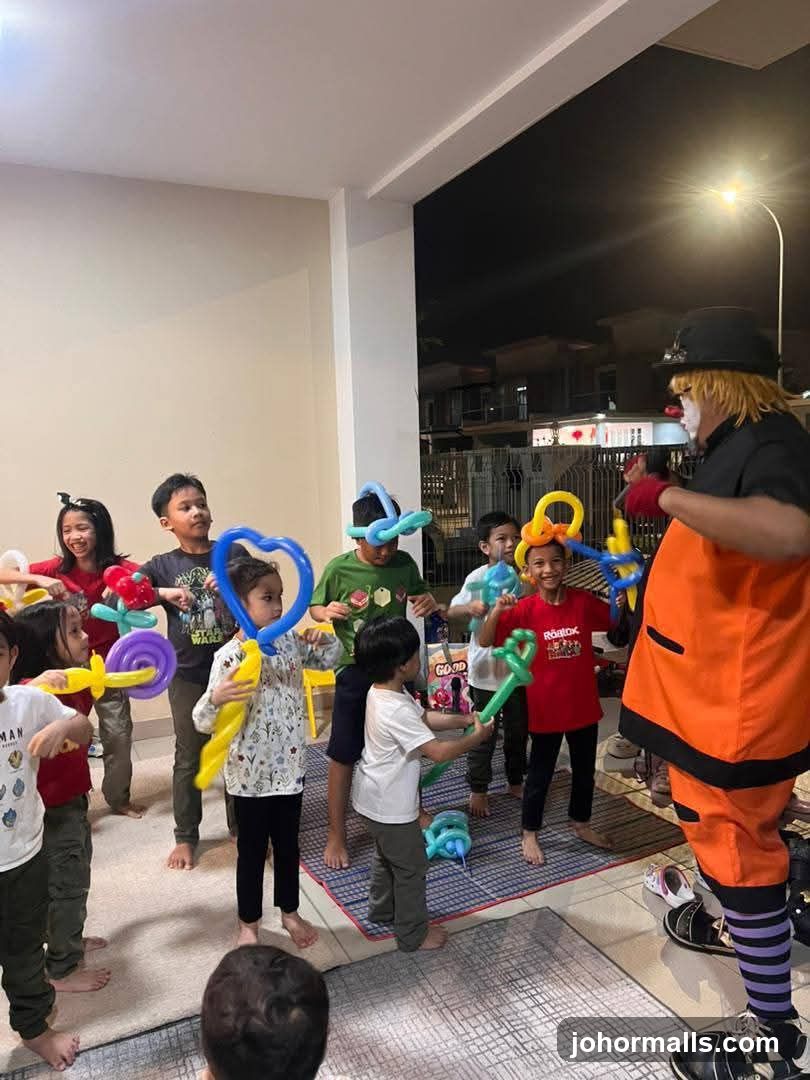 Clown Entertaining Children with Balloon Animals