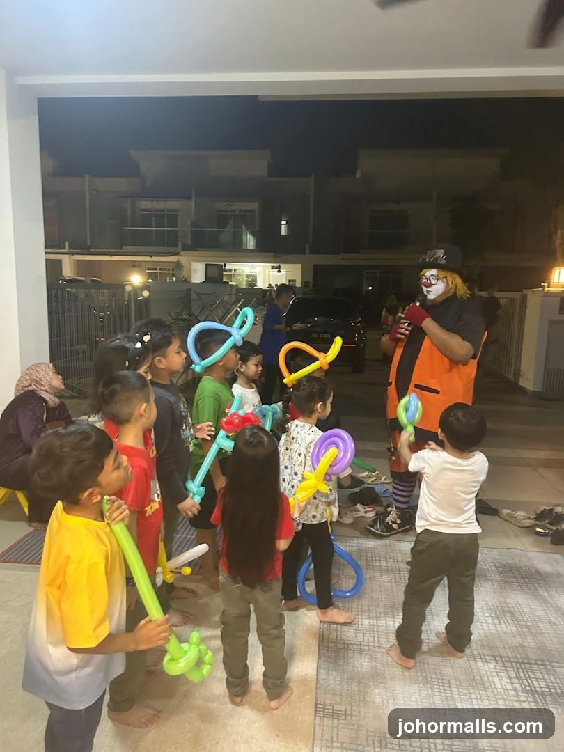 Clown entertaining children with balloon animals