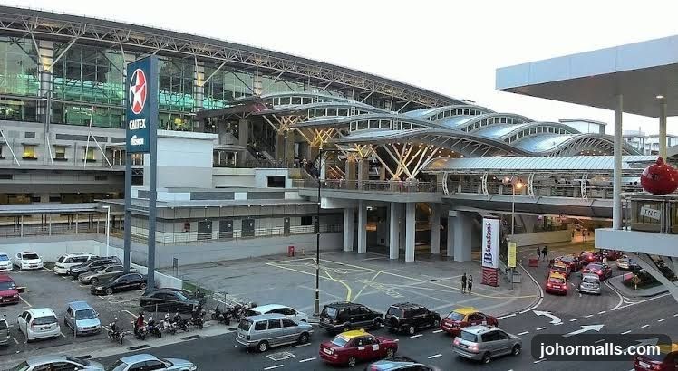 Busy transportation hub with a Caltex sign