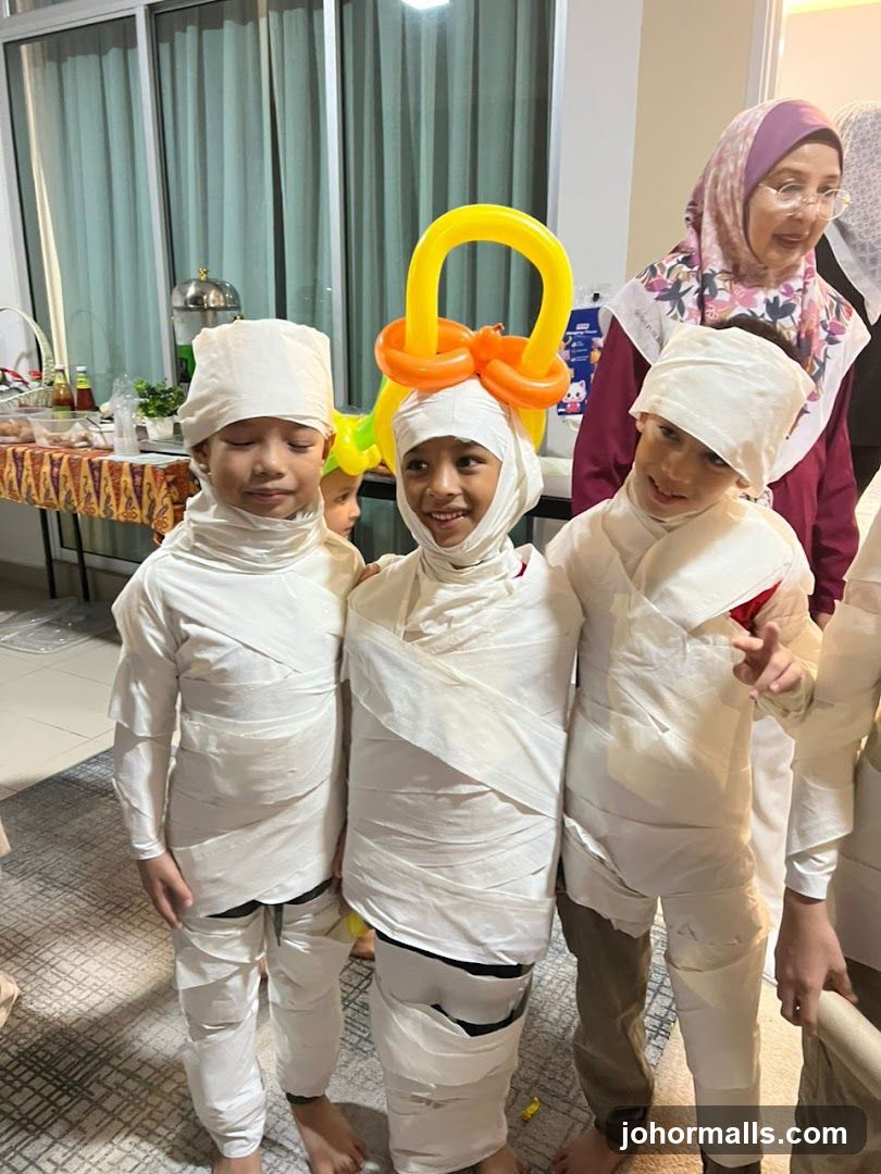 Children dressed as mummies