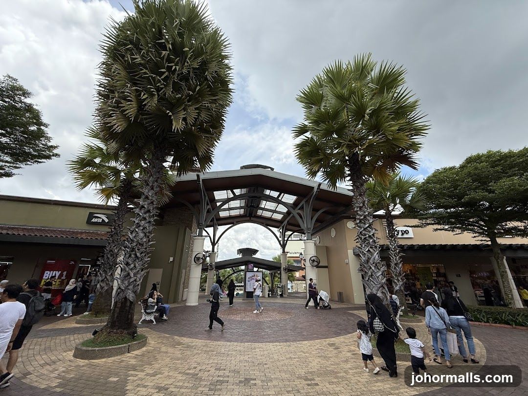 Outdoor shopping area with palm trees