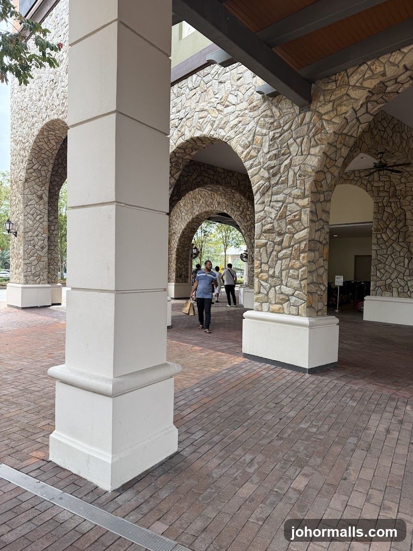 Outdoor walkway with stone arches