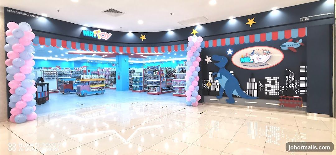 The exterior of a toy store called Mr. Toy, decorated with balloons and a cartoon dinosaur. The store is filled with shelves of toys visible through the entrance.
