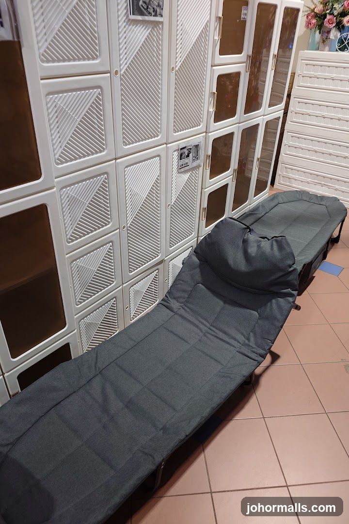 Folding cot and storage cabinets