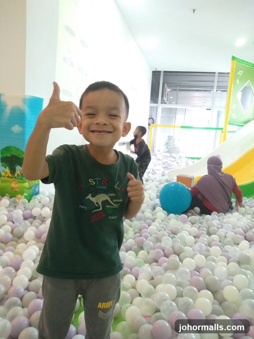 Boy in Ball Pit