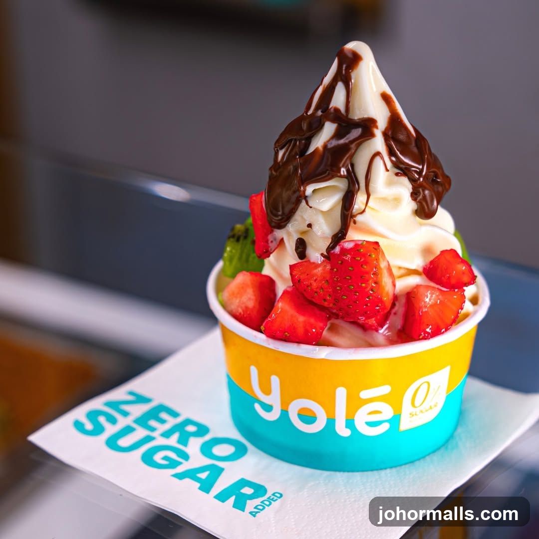 Yolé Frozen Yogurt with Fruit and Chocolate Drizzle
