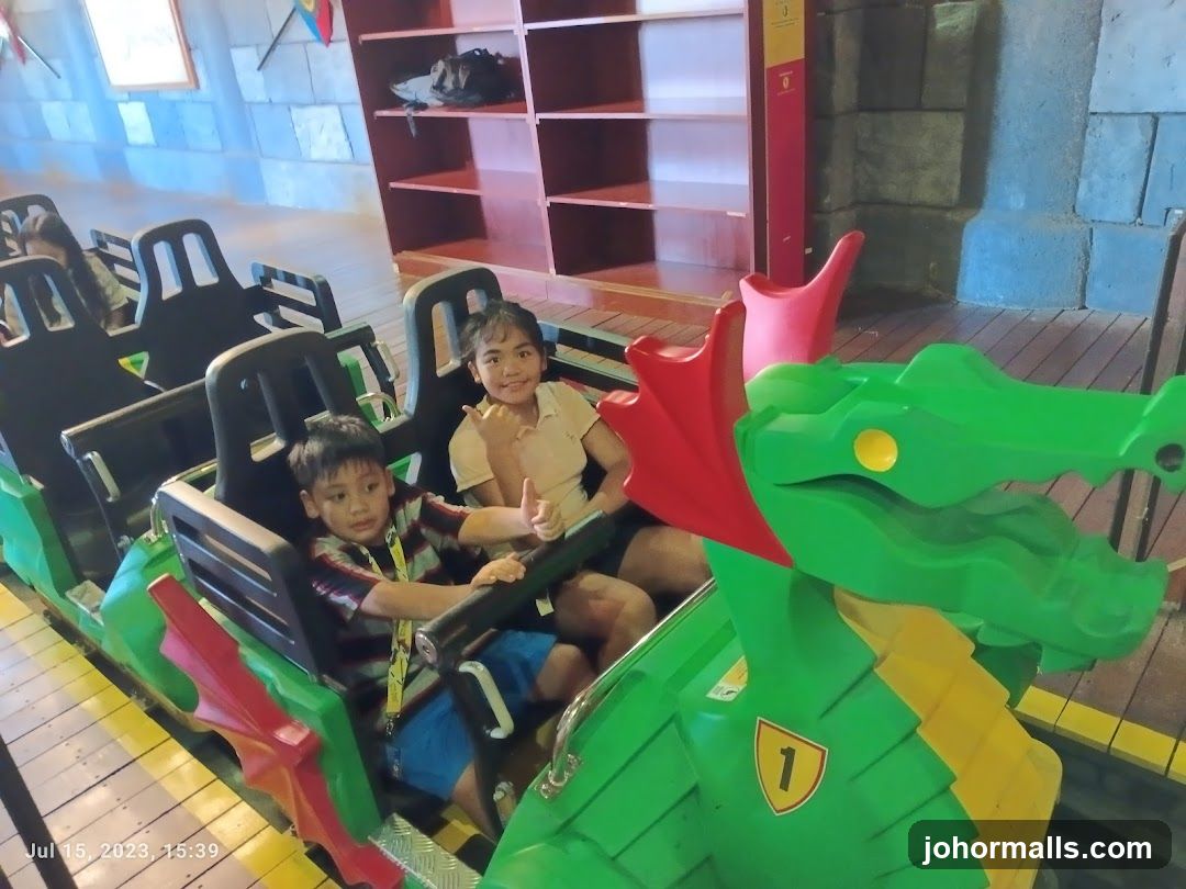 Children on a Dragon-Themed Ride