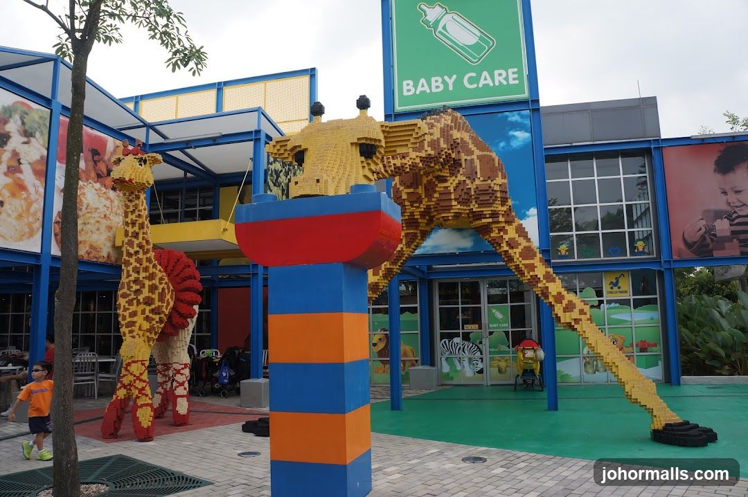 Lego Giraffe Sculptures Outside Building