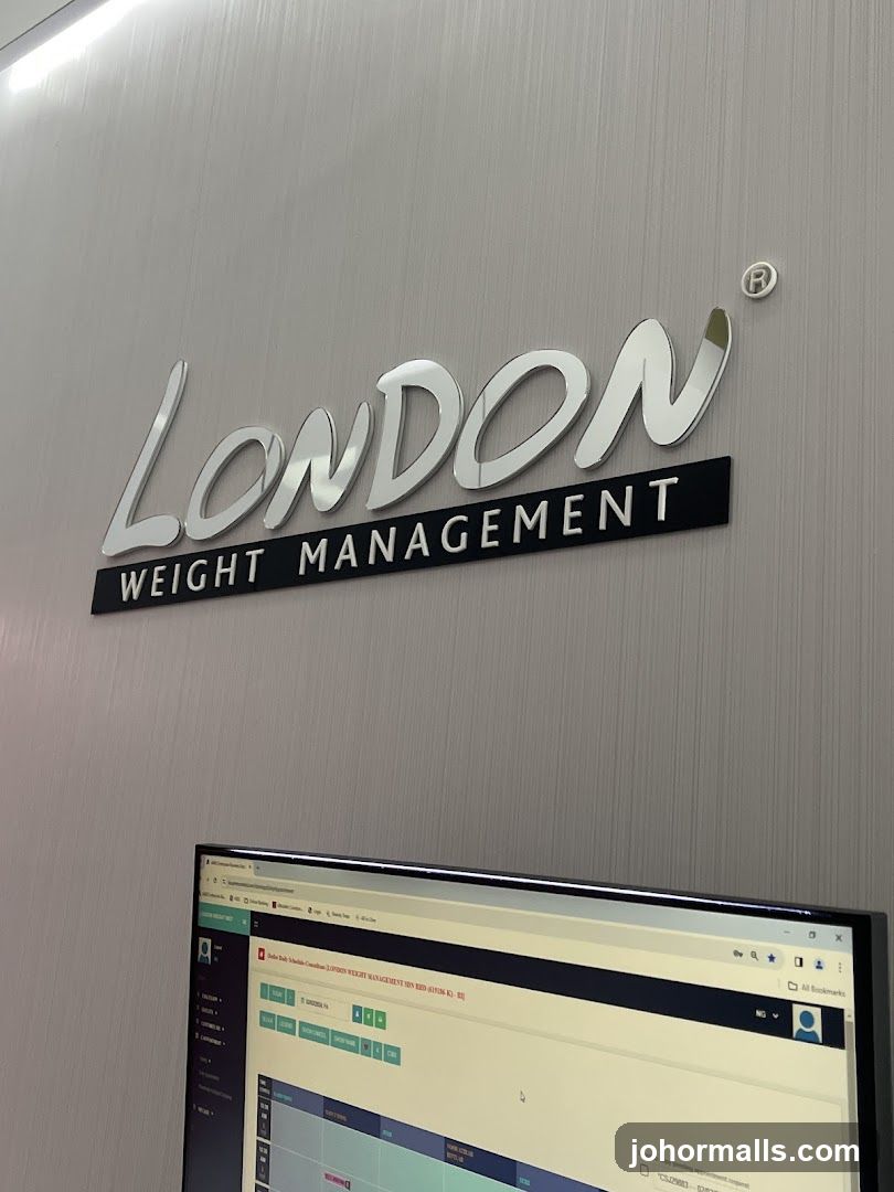 London Weight Management Sign and Computer Screen