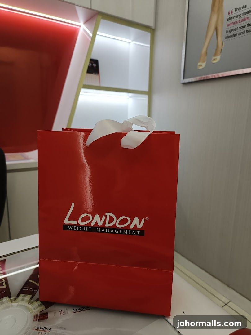 Red shopping bag with London Weight Management logo