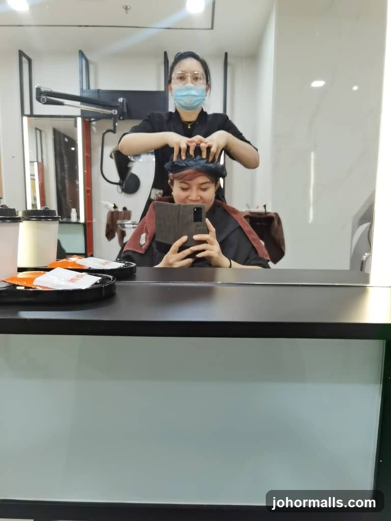 Hairdresser and client in salon