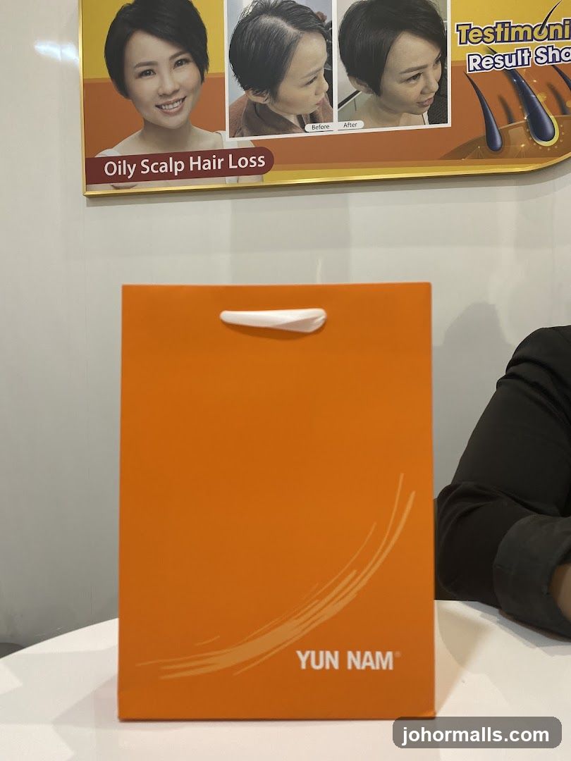Orange Gift Bag with Hair Loss Advertisement