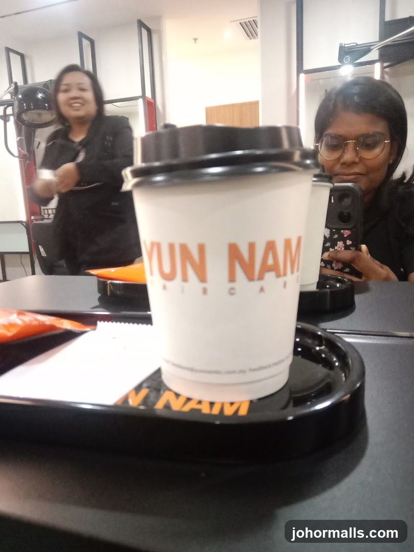 Coffee cup with salon branding