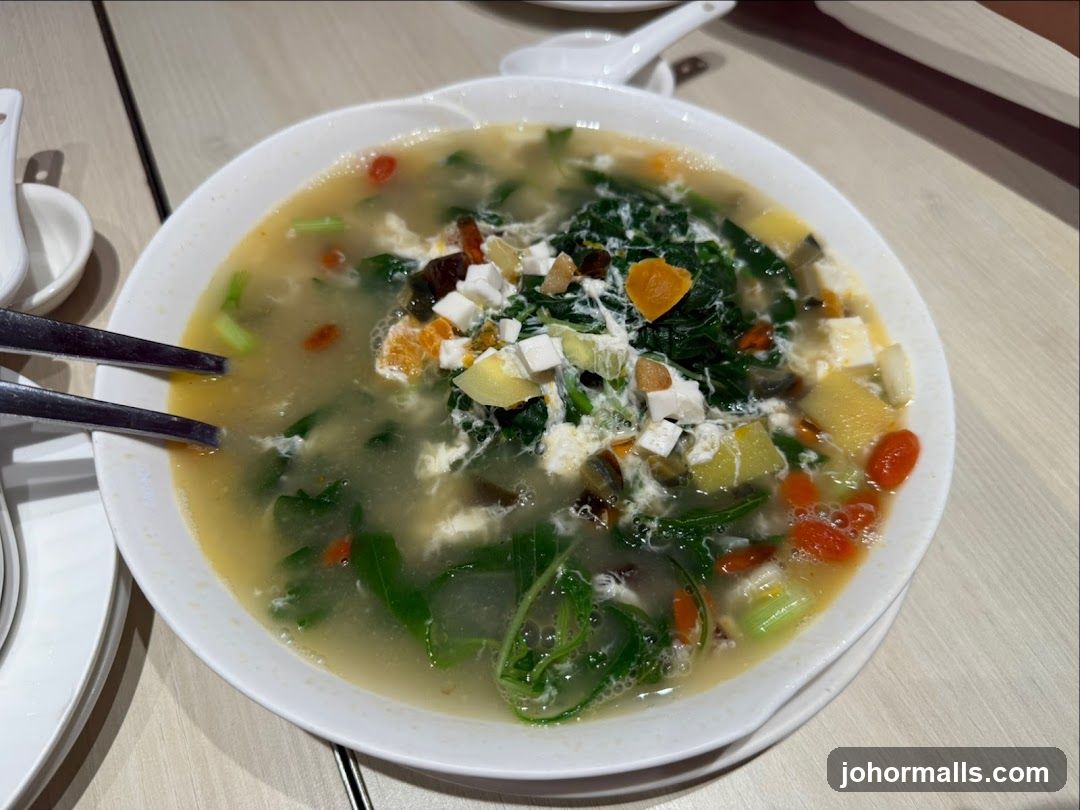 Soup with vegetables and egg