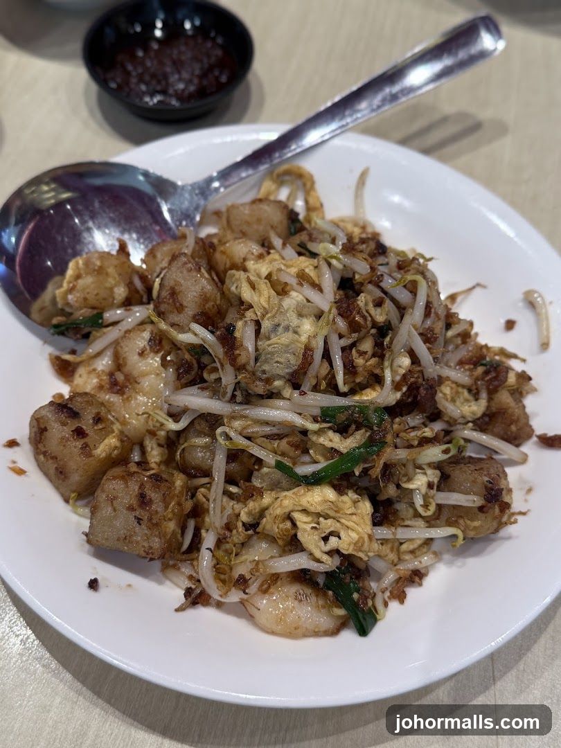 Fried Radish Cake with Eggs and Bean Sprouts