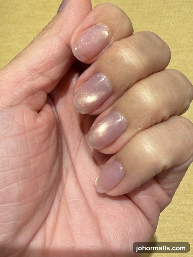 Close-up of a hand with manicured nails