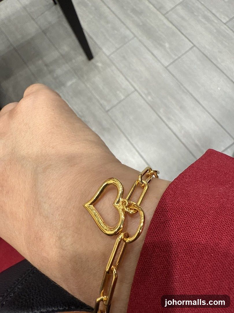 Gold Bracelet with Heart Charm