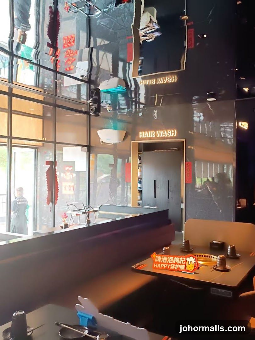 Interior of a restaurant with a "Hair Wash" sign