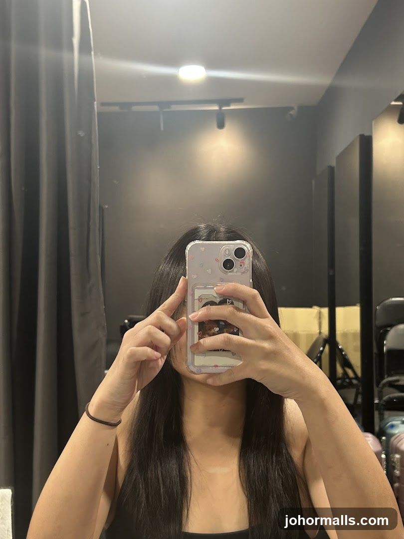 Woman Taking a Mirror Selfie