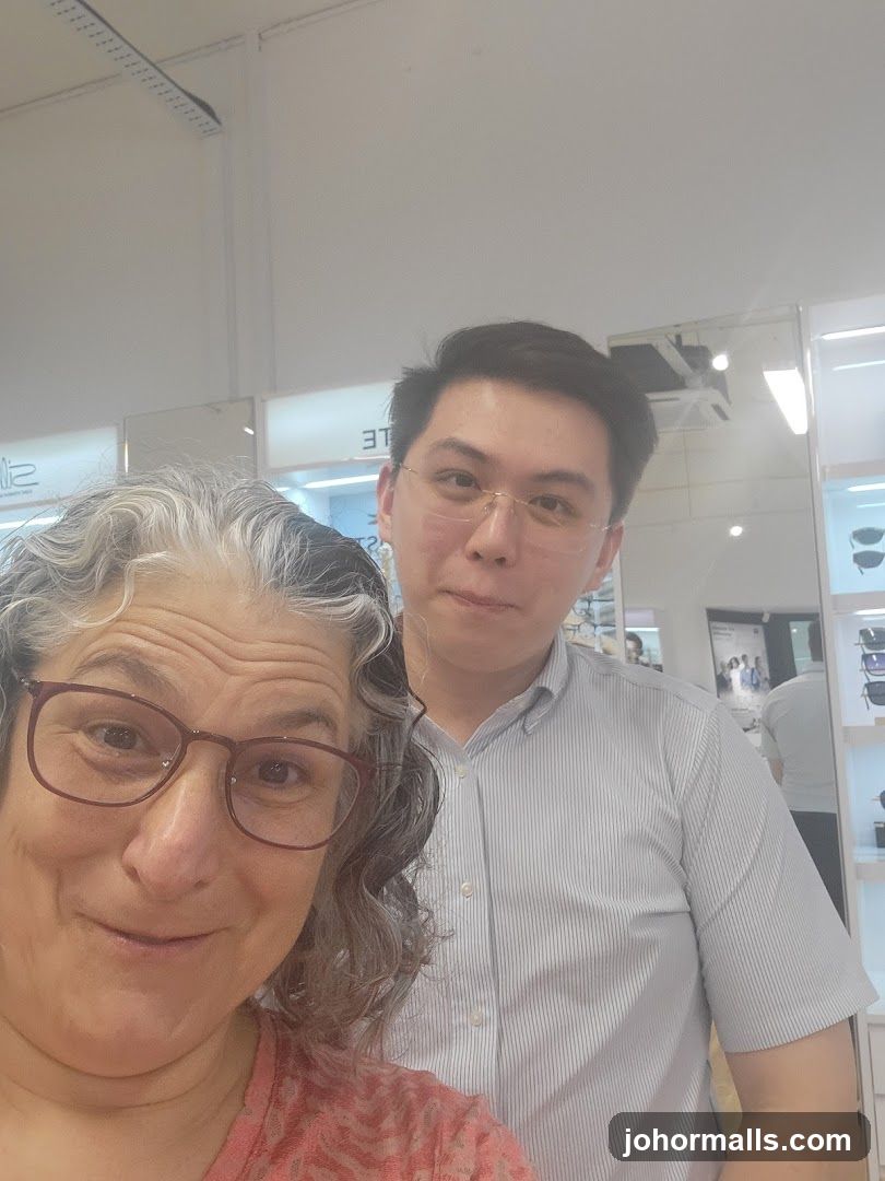 Two people in an optical shop