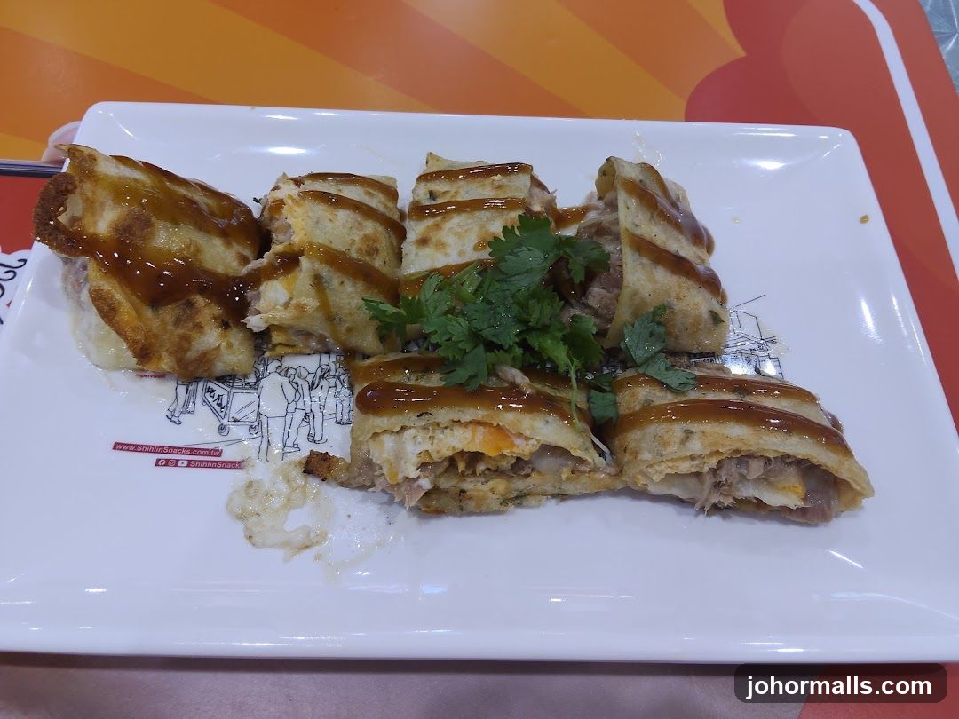 Savory Crepe with Sauce and Garnish