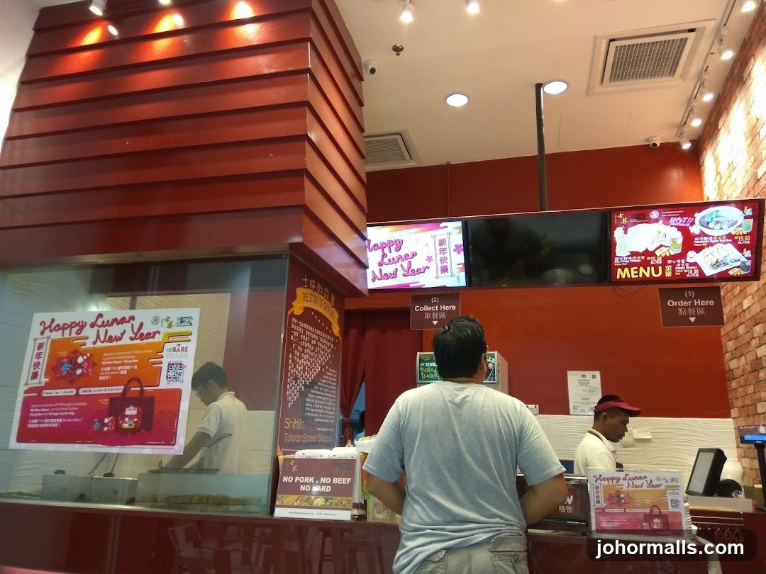 Restaurant Interior with Menu Displays